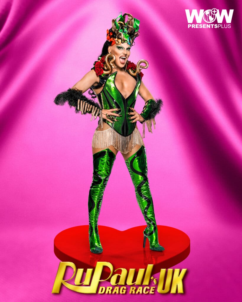 Michael Marouli posing for RuPaul's Drag Race UK series 5 promo for Meet The Queens in a green outfit.