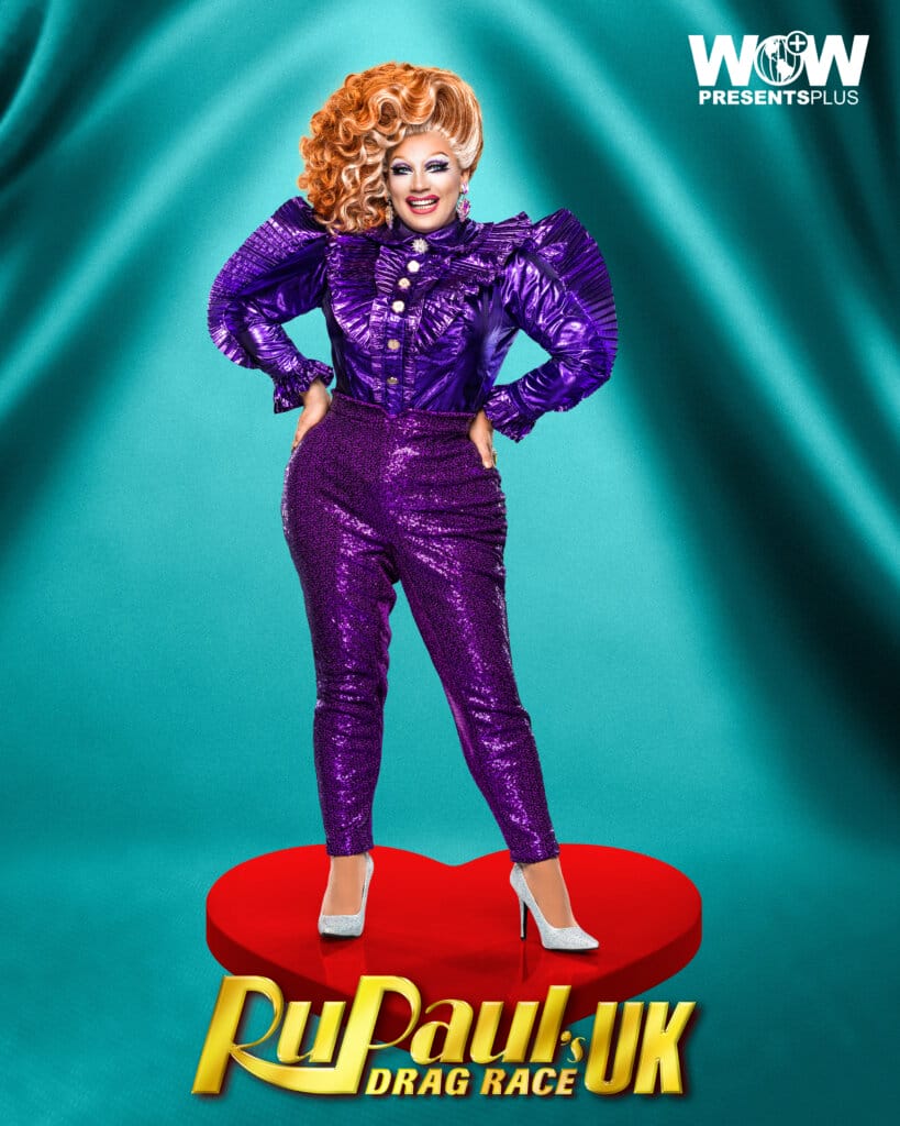 RuPaul's Drag Race UK Series 5: Snatch Game Showdown Ends with an Incredible Lip-Sync For Your Life 34 Ginger Johnson posing for RuPaul's Drag Race UK series 5 promo for Meet The Queens in a purple outfit.