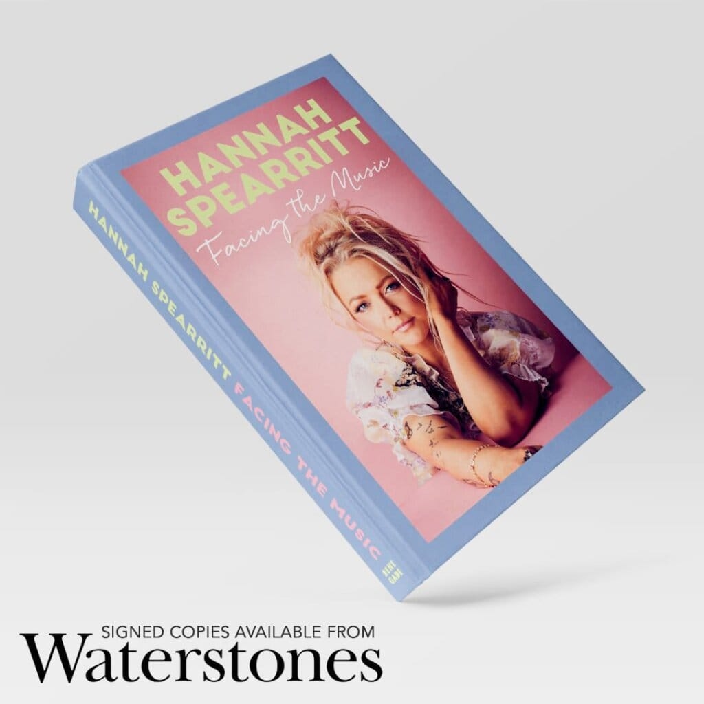 Hannah Spearritt of S Club 7 Announces Signed Editions at Waterstones and Store Signings on the Horizon 18 Hannah Spearritt's book "Facing The Music" positioned on a tilt with a white background. There's some writing in the bottom left announcing "Signed copies available from Waterstones".