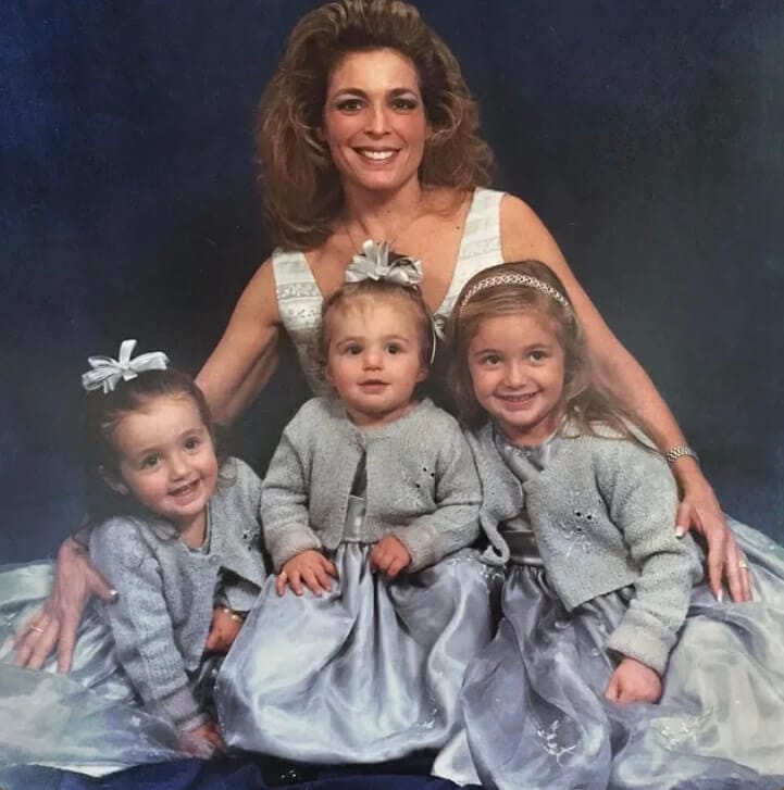 Single cover artwork for "Sailed" which sees an old image of a woman with three young girls sitting in front of her - we presume one of the girls is Kapture and the woman is her mother.