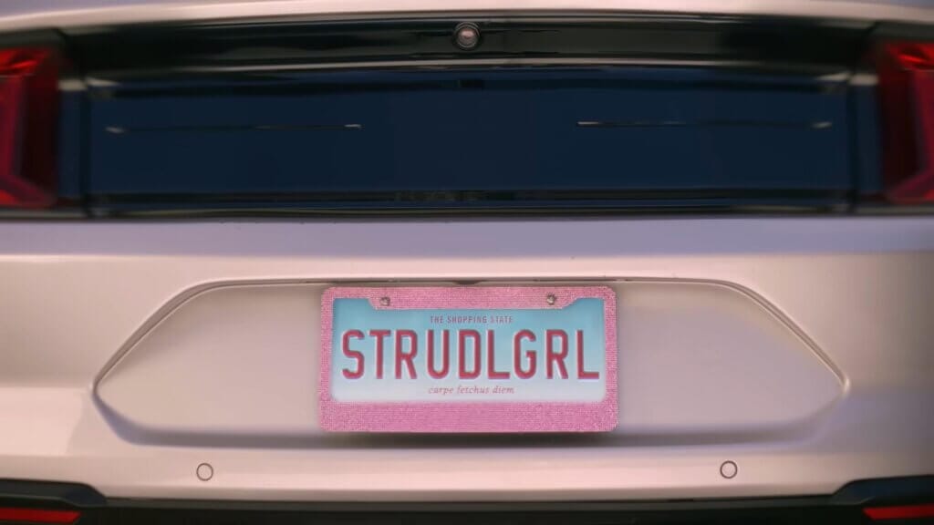 Walmart's Mean Girls Reunion with Lindsay Lohan, Amanda Seyfried, and Lacey Chabert: A Jaw-Dropping Fetch Black Friday Delight 4 Still from Walmart's Mean Girls reunion advert which shows the fetch number plate of Gretchen's car.