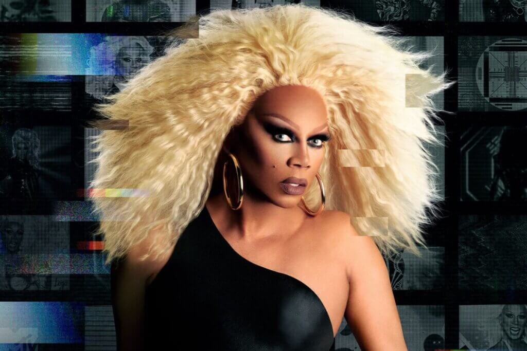 RuPaul's Drag Race Season 16 Premiere: A Night of Extravagance, Twists, and Sapphira Cristál's Unforgettable Performance 51 Cropped version of the official promo image of RuPaul for RuPaul's Drag Race Season 16 which sees her in a black dress and a huge blonde wig.