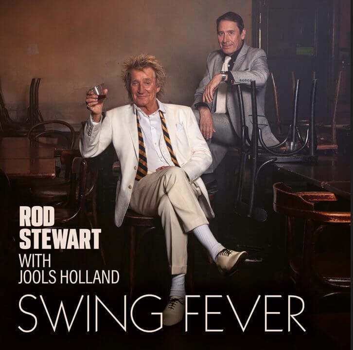 Rod Stewart and Jools Holland's "Swing Fever" Takes the Top Spot on UK Official Albums Chart 10 Album cover for "Swing Fever" which sees both Rod Stewart and Jools Holland sitting in a bar hall with Rod Stewart raising a glass as a toast.