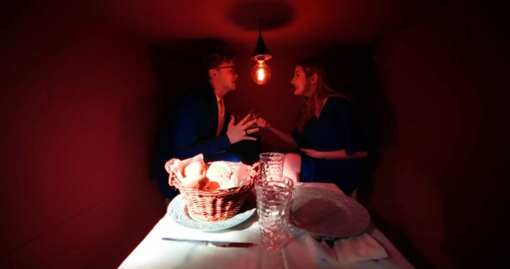 CG5 Unveils "Forbidden Feeling" Single: A New Era in Hyper-Pop Music With A Captivating One-Shot Video 3 Screenshot from the "Forbidden Feeling" music video which sees CG5 on a dinner date with his wife, where they are shouting at each other.