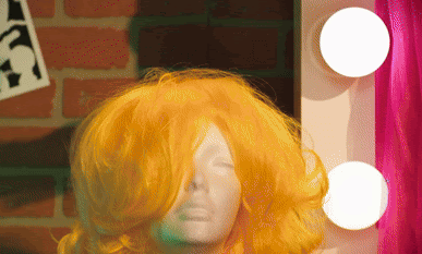 Excitement Builds for "Drag: The Musical" as It Heads to Off-Broadway 34 Gif of someone snatching a wig off a head mannequin for the show "Drag: The Musical".