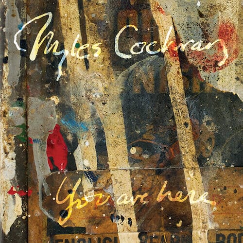 Official single cover artwork for "The Deepest Sea" by Myles Cochran which is the same as the "You Are Here" artwork which shows an abstract image of brown colours in a water-like way, almost similar to wood found at the bottom of the ocean.