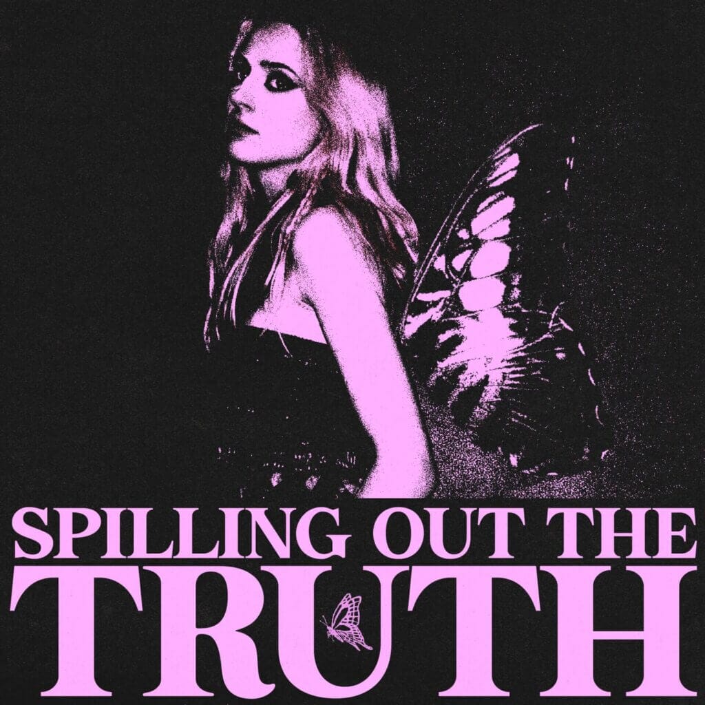 Official EP artwork for "Spilling Out The Truth" which "She's A Scorpio" is a part of. We see Lizzie Esau in a forest with fairy wings, but the image is filtered with a two-tone of pink and black. The EP's title can be found at the bottom of the image.