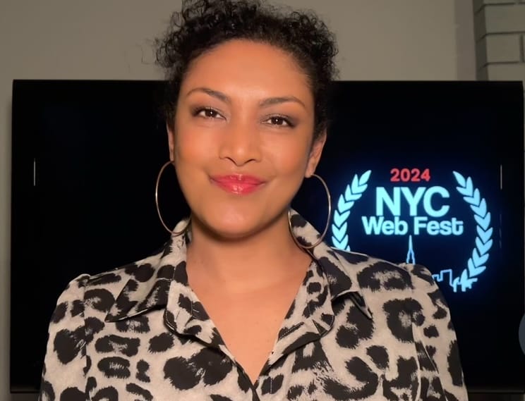 Lauren Atkins wearing an animal-print shirt as she appears virtually for the 2024 NYC Web Fest.