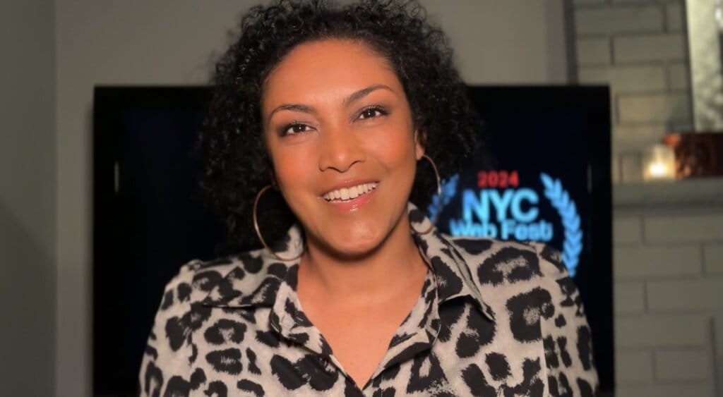 NYC Web Fest 2024 Award Winners: Celebrating the Best in Digital Storytelling with Award-Winning Web Series, Short Films, and Pilots 35 Founder of the NYC Web Fest, Lauren Atkins wearing an animal-print shirt and appearing at the festival virtually.