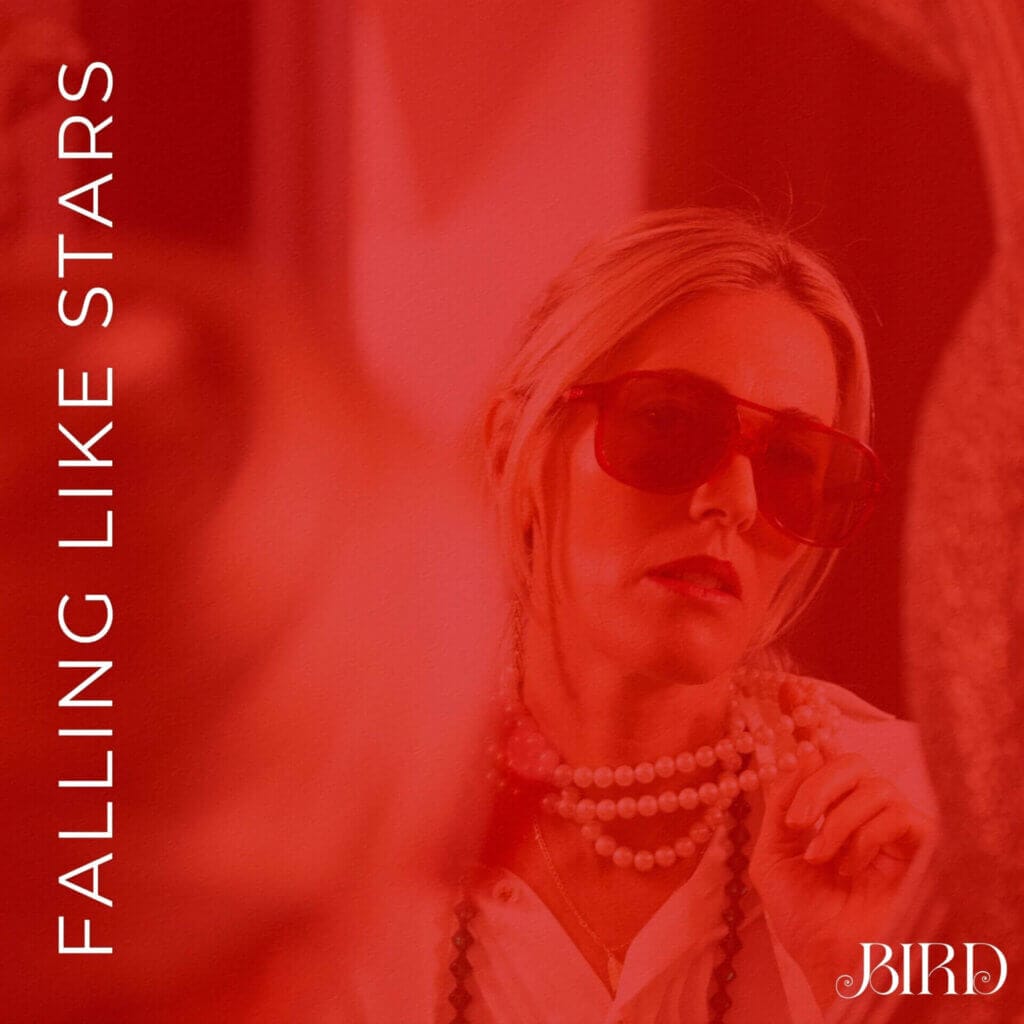Bird Revives "Falling Like Stars" to Mark 20 Years Since Her Debut Album With an Awesome 2024 Remaster 20 Official single cover artwork for "Falling Like Stars" which shows Bird looking in a mirror at herself wearing a cream blouse and red shades, while holding out her pearl-like necklace to the mirror. The entire image has a red filter over it.