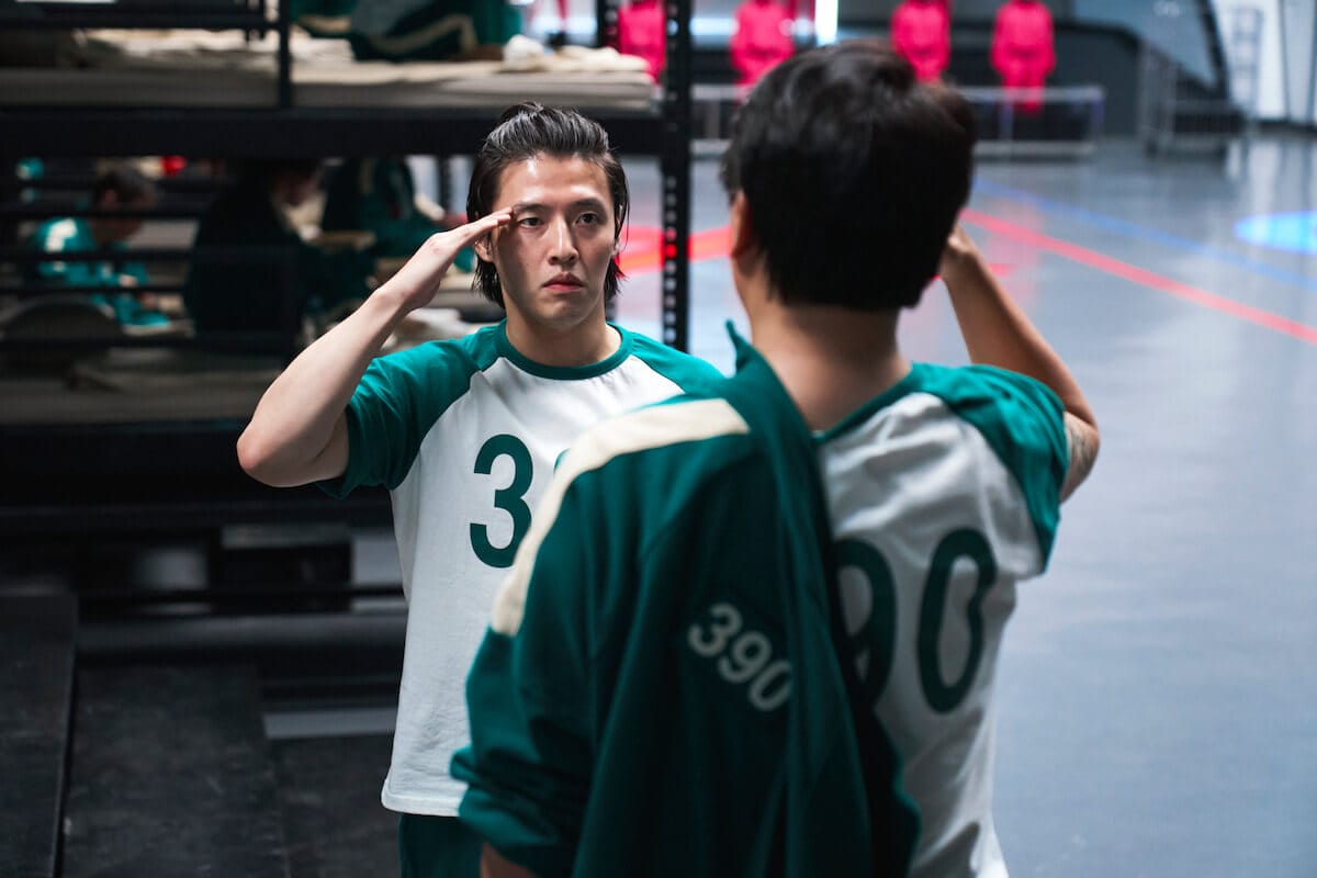 Squid Game Season 2 Shatters Netflix Records and Dominates Global Viewership 34 Two players from Squid Game Season 2 saluting one another.