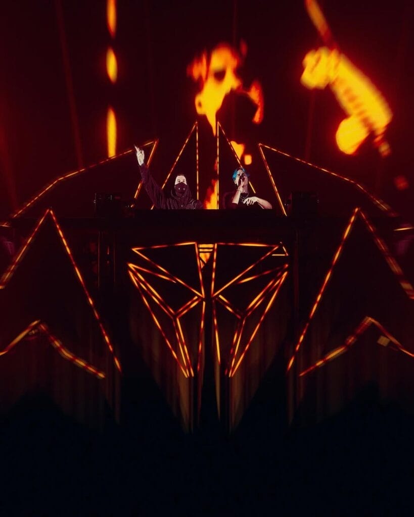 Viral Remix of Alan Walker and MEEK’s “Dancing In Love” by Tribbs Officially Released After Polish Live Debut at Walkerworld 4 Alan Walker and Tribbs performing on stage together with Tribbs talking through the microphone as both of them are behind the DJ deck.