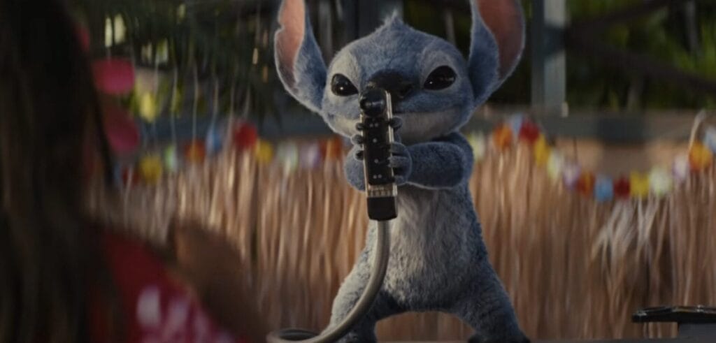 Stitch standing on a Hawaiian bar, holding a drink dispenser gun at Lilo as if it's a real gun.