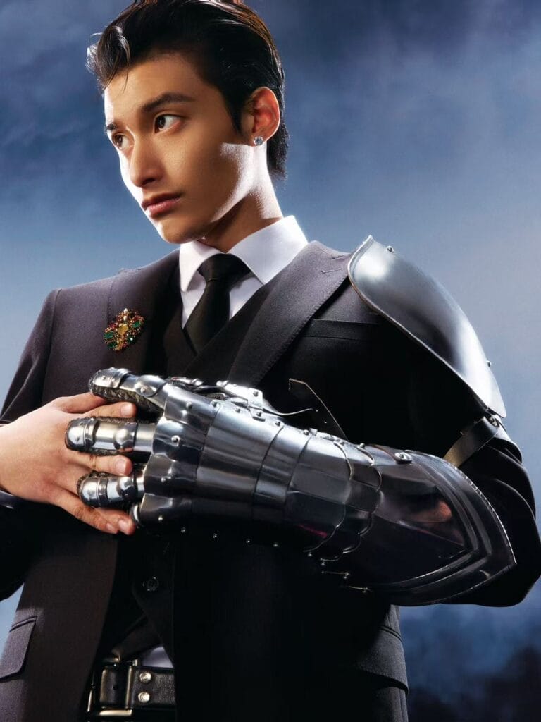 BENZO with dark hair, wearing a black suit with a white shirt and black tie, alongside a robotic left arm, where he is punching his human hand into the robotic hand.