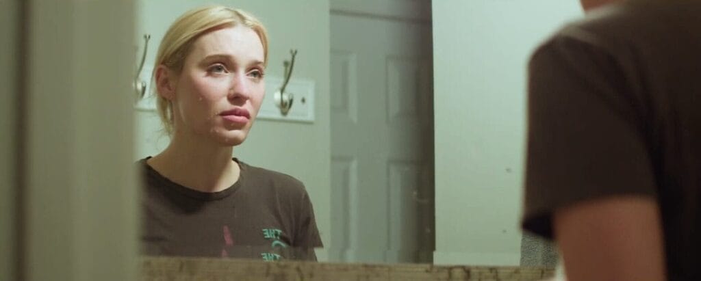 Freak Off: The Bold New Drama That Pulls Back the Curtain on the Music Industry 8 Still from Freak Off which shows Ayla Demirci crying in a mirror.