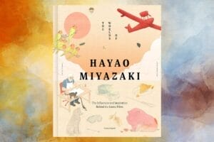 A whimsical yellow to blue gradient watercolour background with the book "The World of Hayao Miyazaki" by Nicolas Rapold in the foreground.
