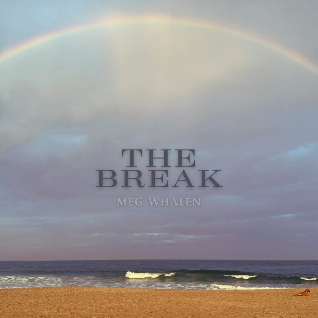Official single cover artwork for "The Break" by Meg Whalen, which sees a beach with a wave crashing over the beach with a rainbow in the cloudy sky and the title in the middle in a dark blue.