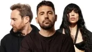 Official promotional image for "Pum Pum" which sees all three artists wearing black, with Dimitri Vegas in the foreground and David Guetta to the left looking to the left, and Loreen on the right.