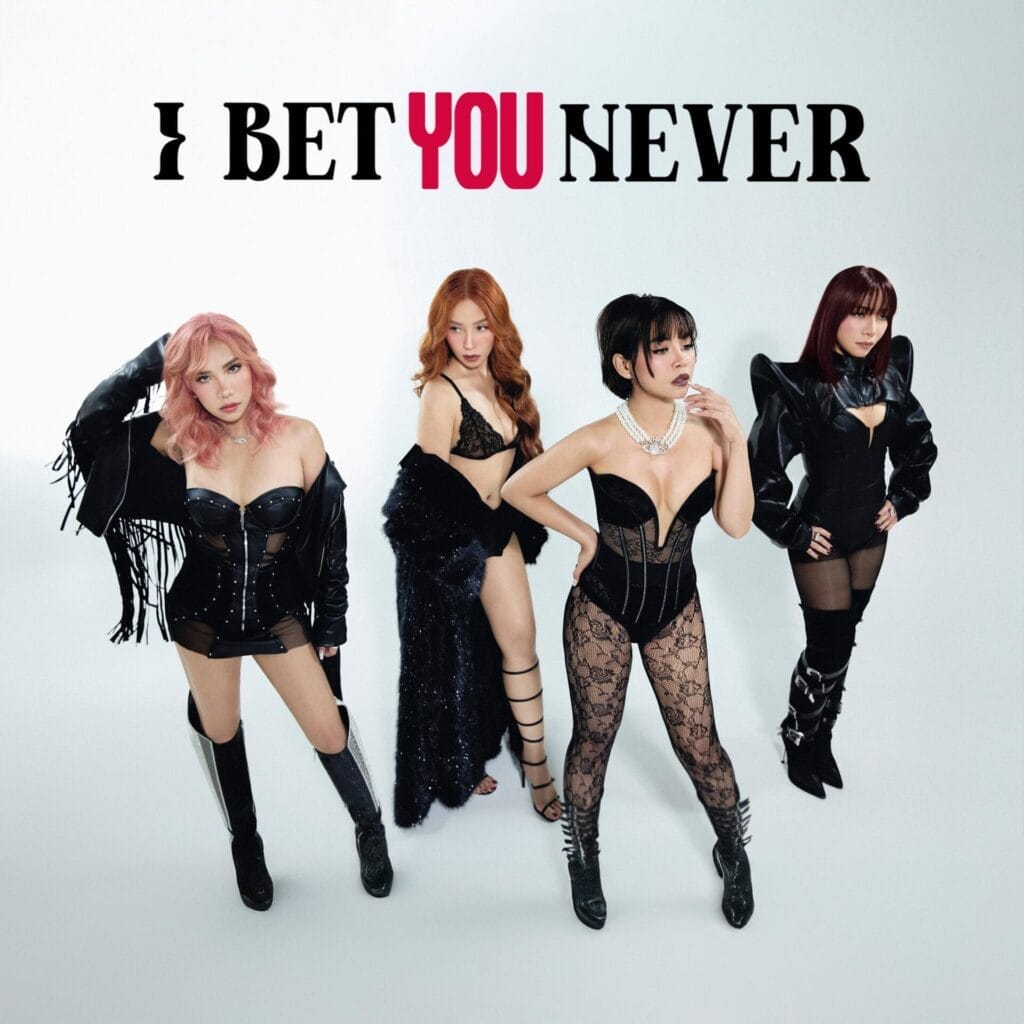 The official single cover artwork for "I Bet You Never" which shows 4th Impact all wearing black outfits backed by a white wall and the title is at the top with the "You" in red, with the rest in black.