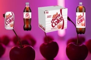 Diet Cherry Coke bottles, a can, and a 24-pack box float above cartoon cherries against a vibrant pink and purple gradient background.