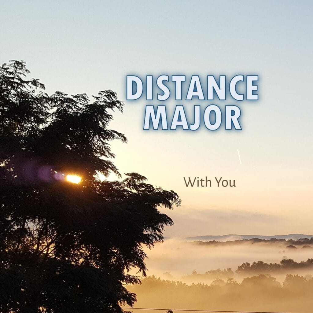New Jersey Producer Distance Major Explores Cinematic Soundscapes on “With You” 11 Official single cover artwork for "With You" which shows a sunrise over misty hills with trees silhouetted, a serene atmosphere. Text reads "Distance Major" in bold, and "With You" in smaller font.